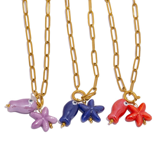 Collar con colgante de pez y estrella de mar