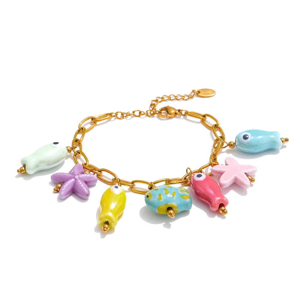 Collar y pulsera con forma de estrella de mar y pez