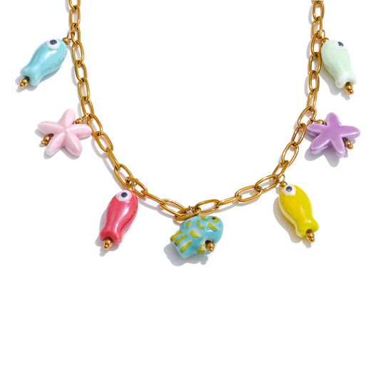 Collar y pulsera con forma de estrella de mar y pez
